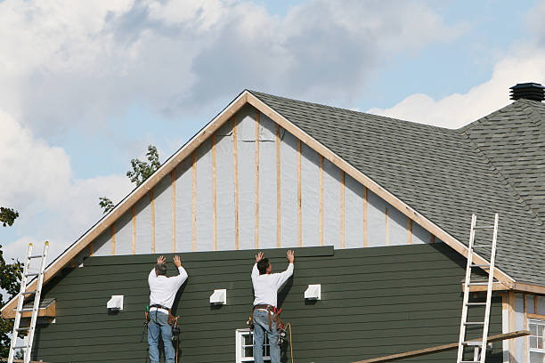 Professional Siding Contractor technician working in Lenoir, NC